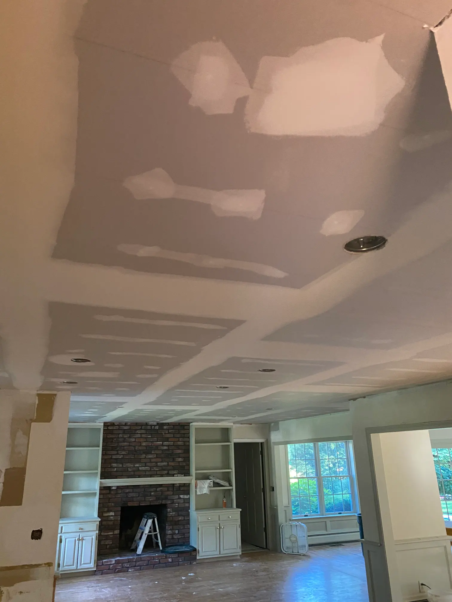 sheetrock over popcorn texture ceilings